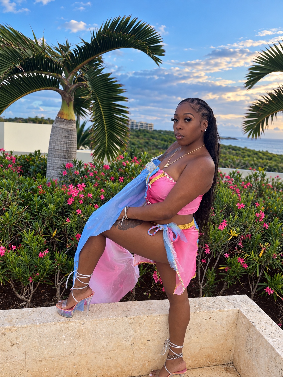 Model in a pink TRUEGEM resort look inspired by Caribbean color
